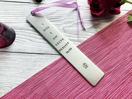 Hand stamped bookmark, a book a day keeps reality away, personalised book mark, book lovers gift, graduation gift