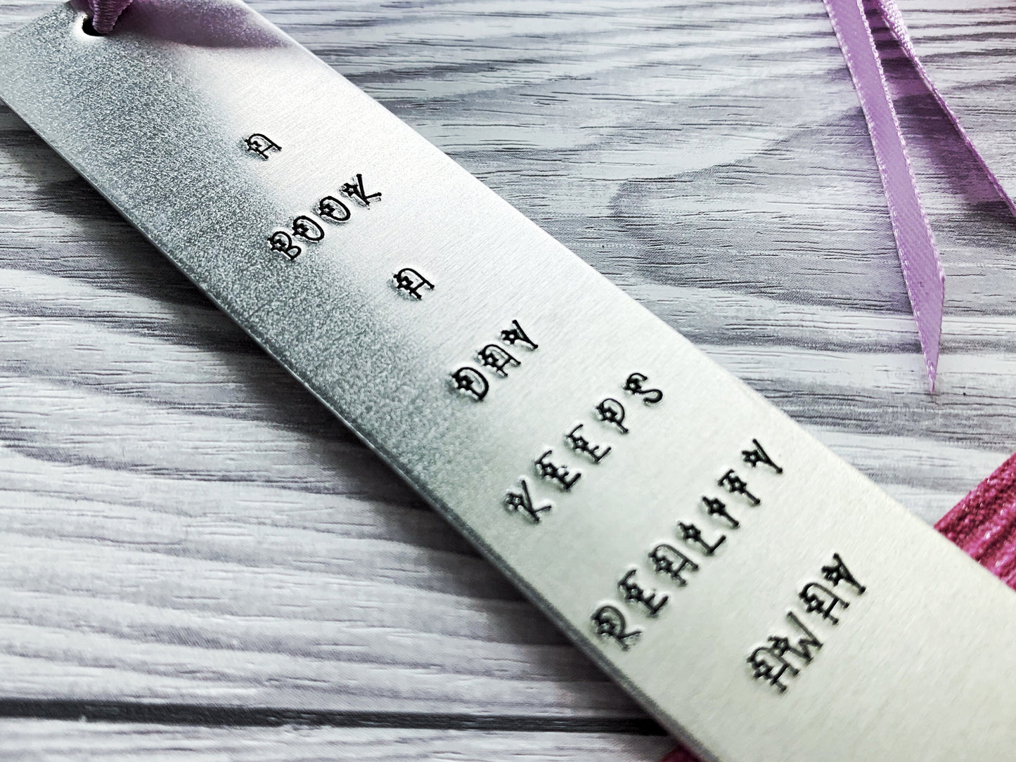 Hand stamped bookmark, a book a day keeps reality away, personalised book mark, book lovers gift, graduation gift